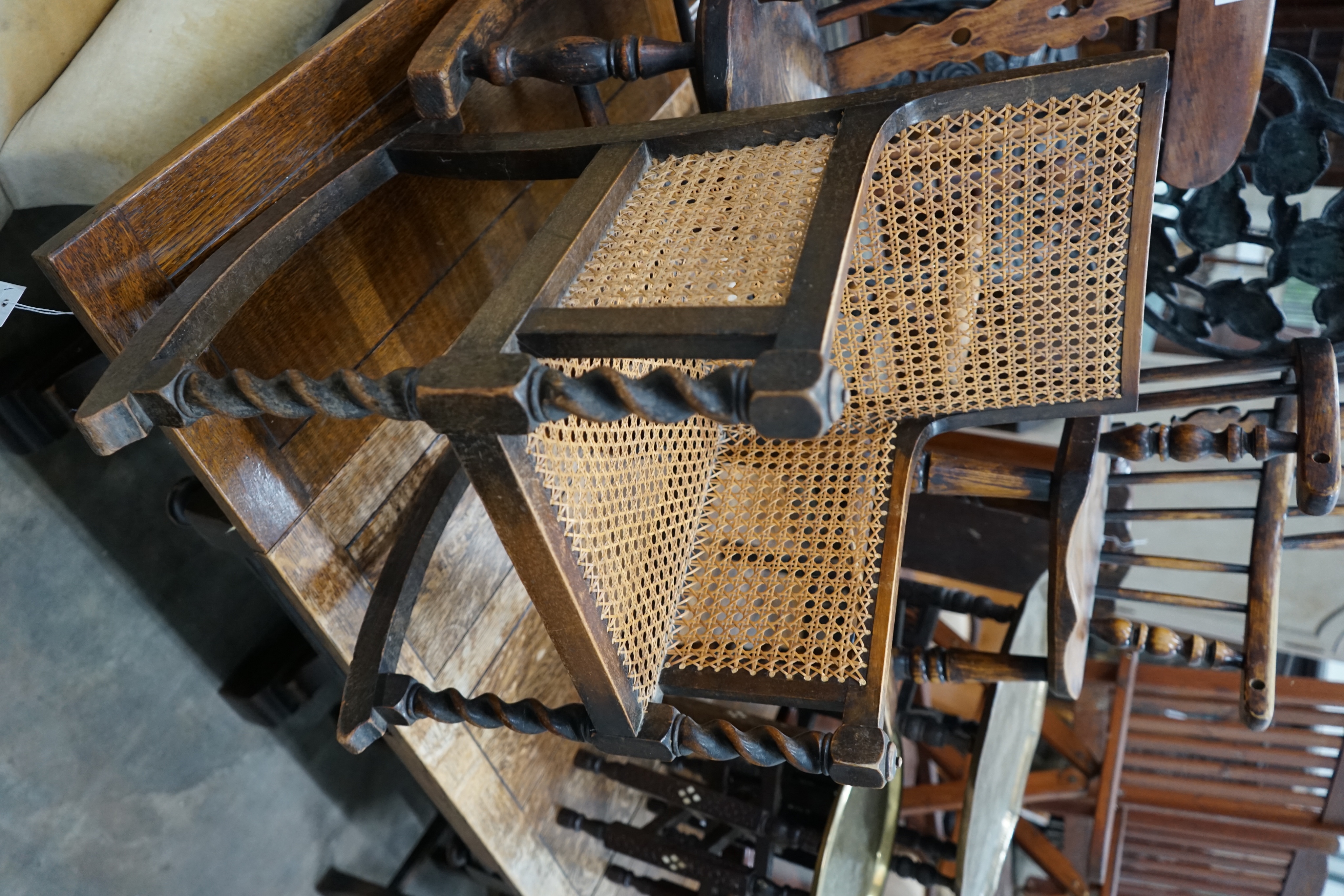 A Victorian elm and beech Windsor child's rocking chair, a Victorian style Windsor high chair and one other child's chair